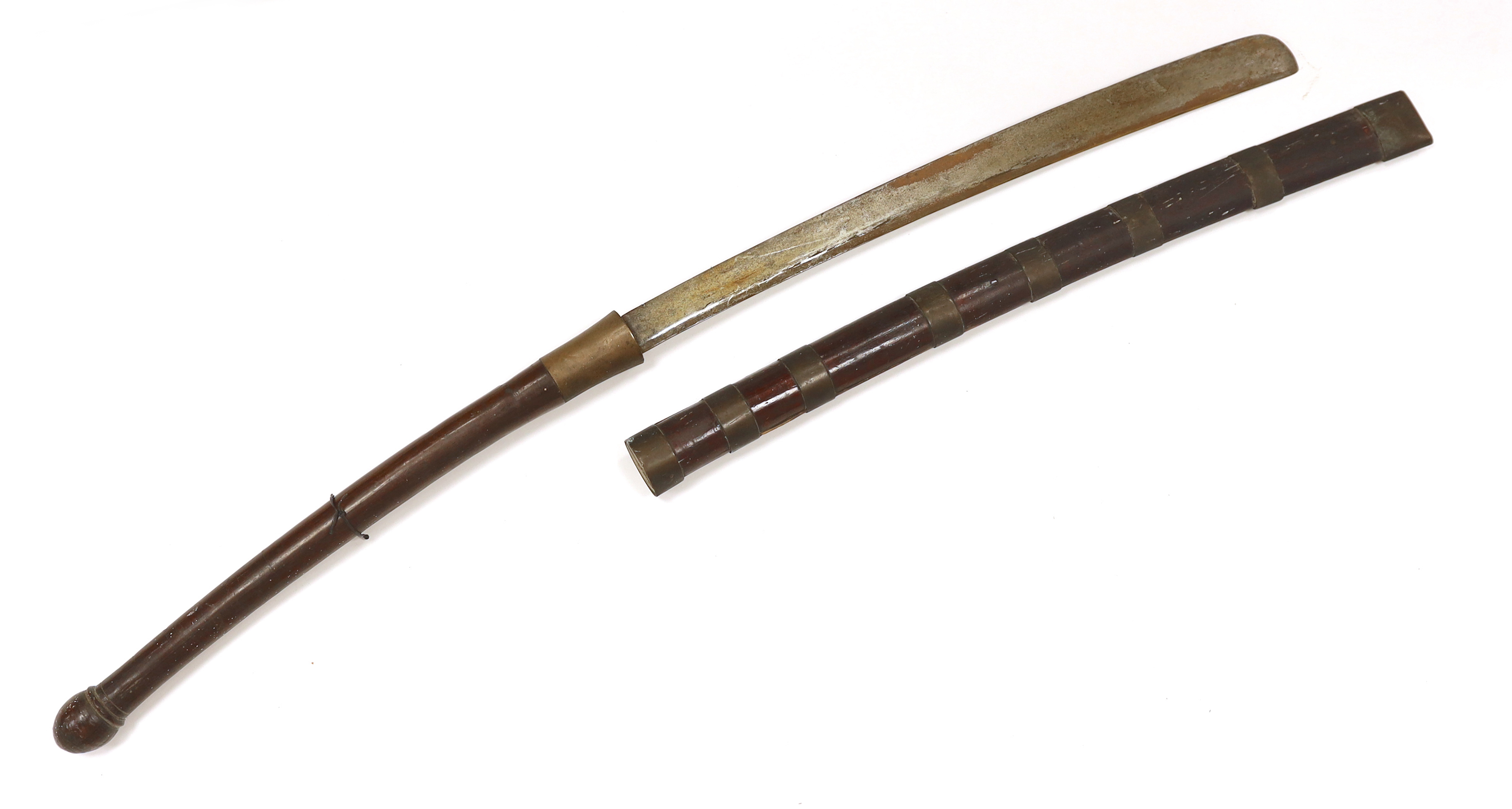 A large 19th century Burmese dha, in a wooden scabbard with metal bands, long wooden grip, blade 67.5cm